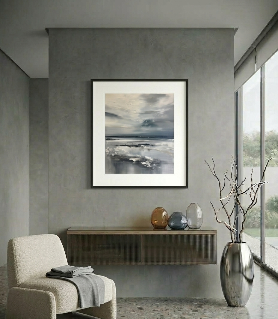 Modern interior with a framed artwork on a gray wall, a chair, and decorative items.